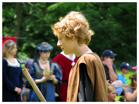 A young guard makes his way through the crowd