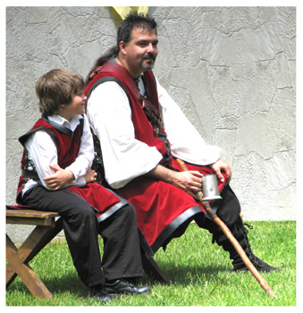 The elder Knight and a youngster share a smile at the Tournament ringside.