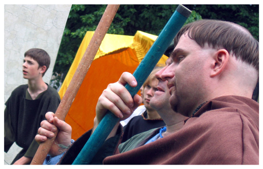 the good Friar sits with some similarly equipped contemporaries