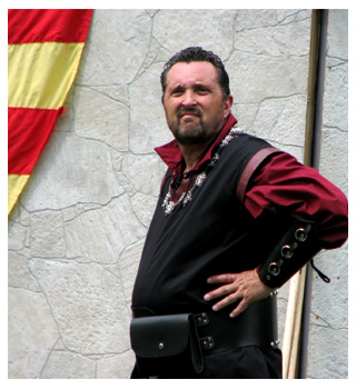 glowers malevolently at anyone who falls under his gaze